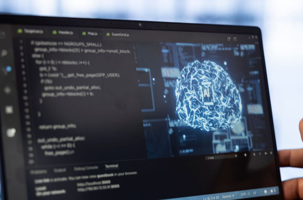 computer-scientist-using-laptop-data-center-updating-ai (1).jpg